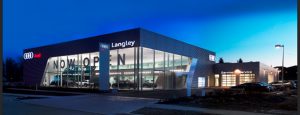 Exterior shot of Audi dealership featuring oversized, insulated glass units combining low-e and clear glass.