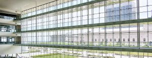 Interior shot of the Cleveland Medical Mart featuring AGNORA fabricated oversized structural glass fins.