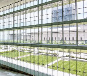 Interior shot of the Cleveland Medical Mart featuring AGNORA fabricated oversized structural glass fins.