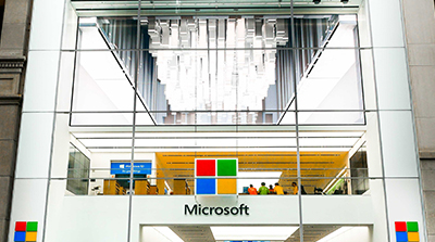 Street view of Microsoft's flagship store on 5th ave, Microsoft's Facade features oversize triple laminates.