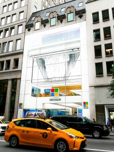 Street view of Microsoft's flagship store on 5th ave, Microsoft's Facade features oversize triple laminates.