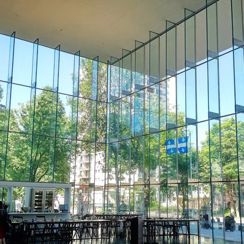 Interior view of Pierre Lassonde Pavillion, in the Musée des Beaux-Arts, showcasing 5-Layer Laminated Glass Fins