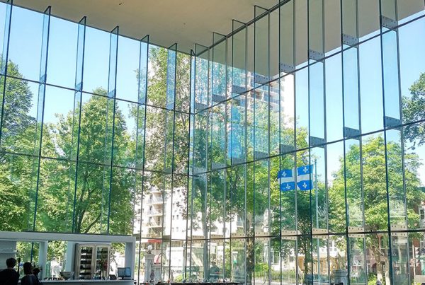 Interior view of Pierre Lassonde Pavillion, in the Musée des Beaux-Arts, showcasing 5-Layer Laminated Glass Fins