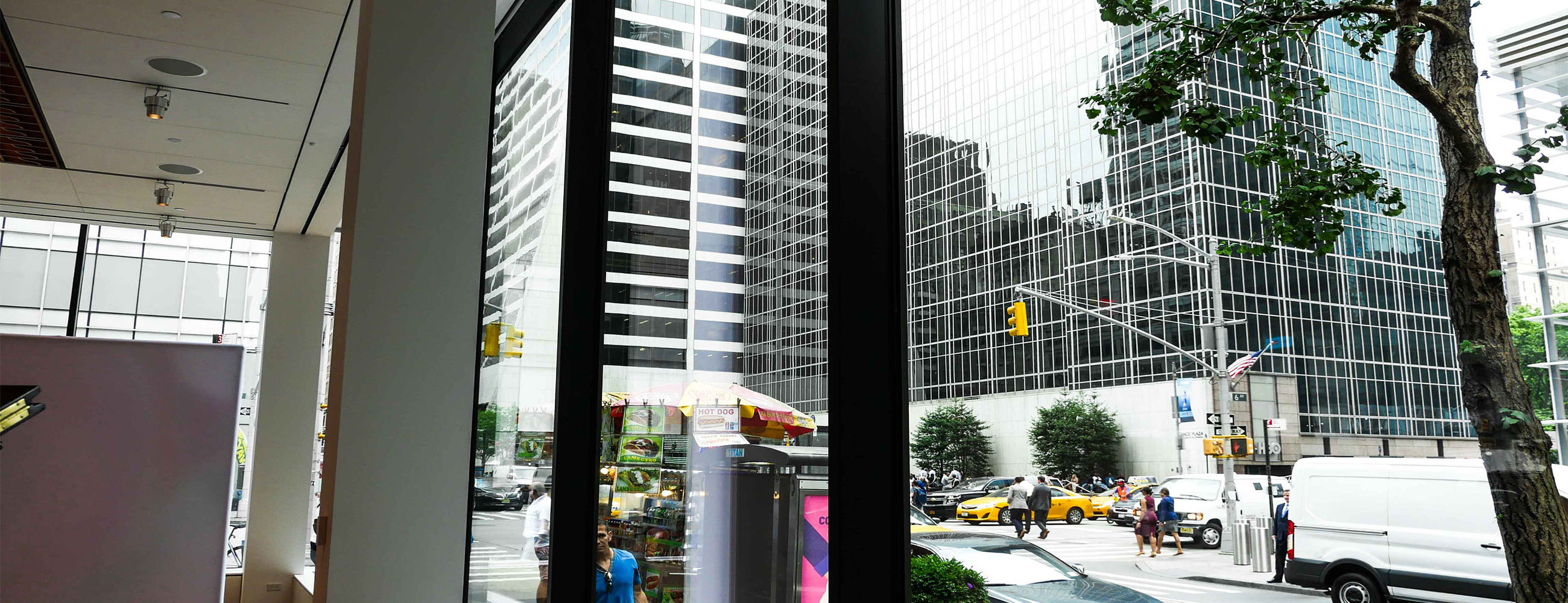 Inside Steinway & Sons looking at grand pianos and insulated glass units consisting of low-iron and low-e glass